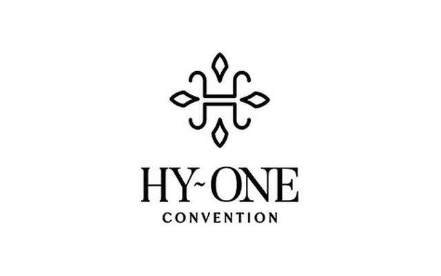 Hy~One Convention: the H, drawn like a jharokha ornament.